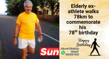 An elderly man walking.