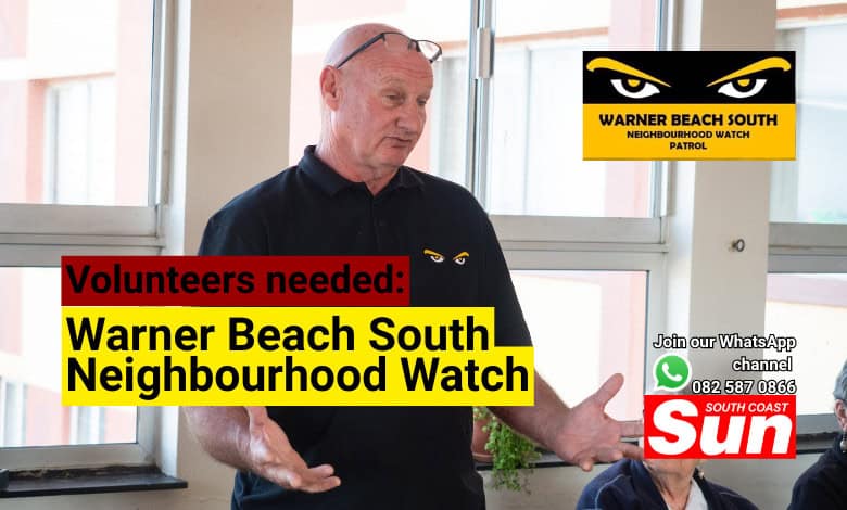 A man speaking to elderly people.