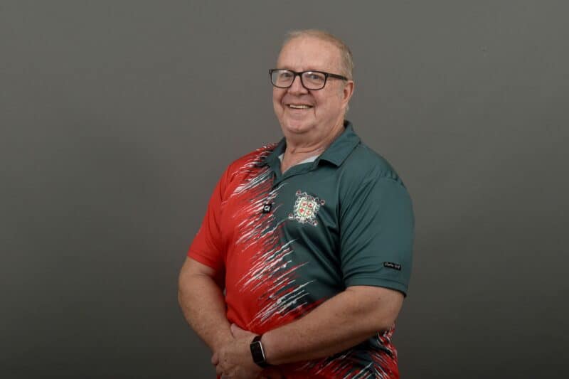 A portrait of a man smiling. 