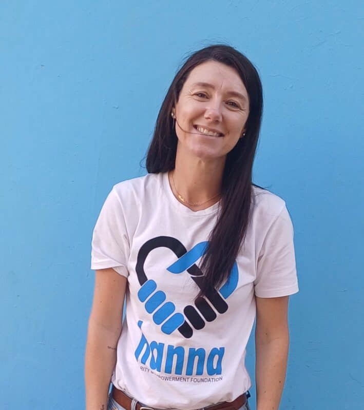 A woman smiling.