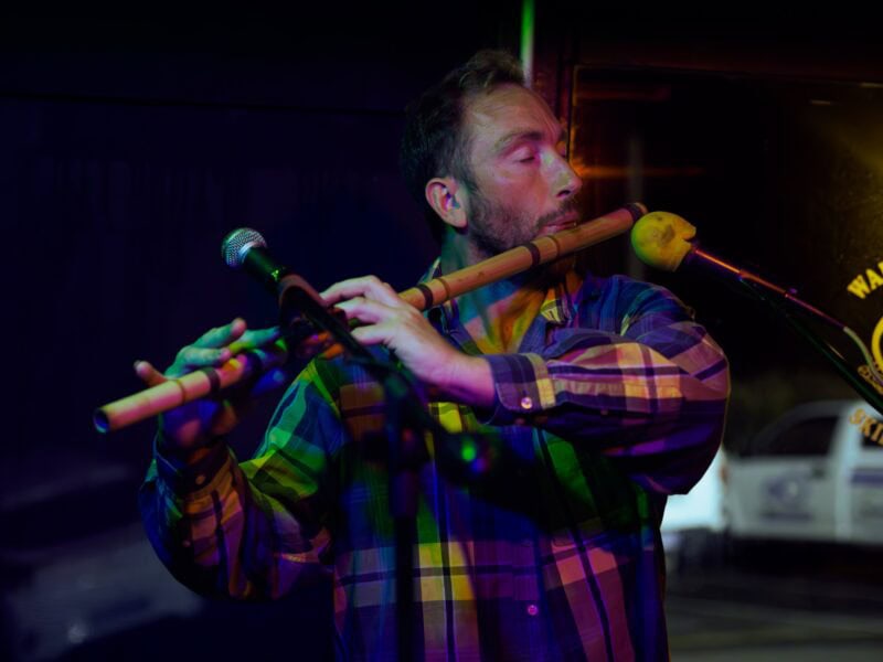 A man playing the flute.