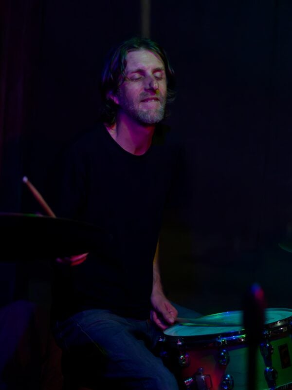 A man playing drums.