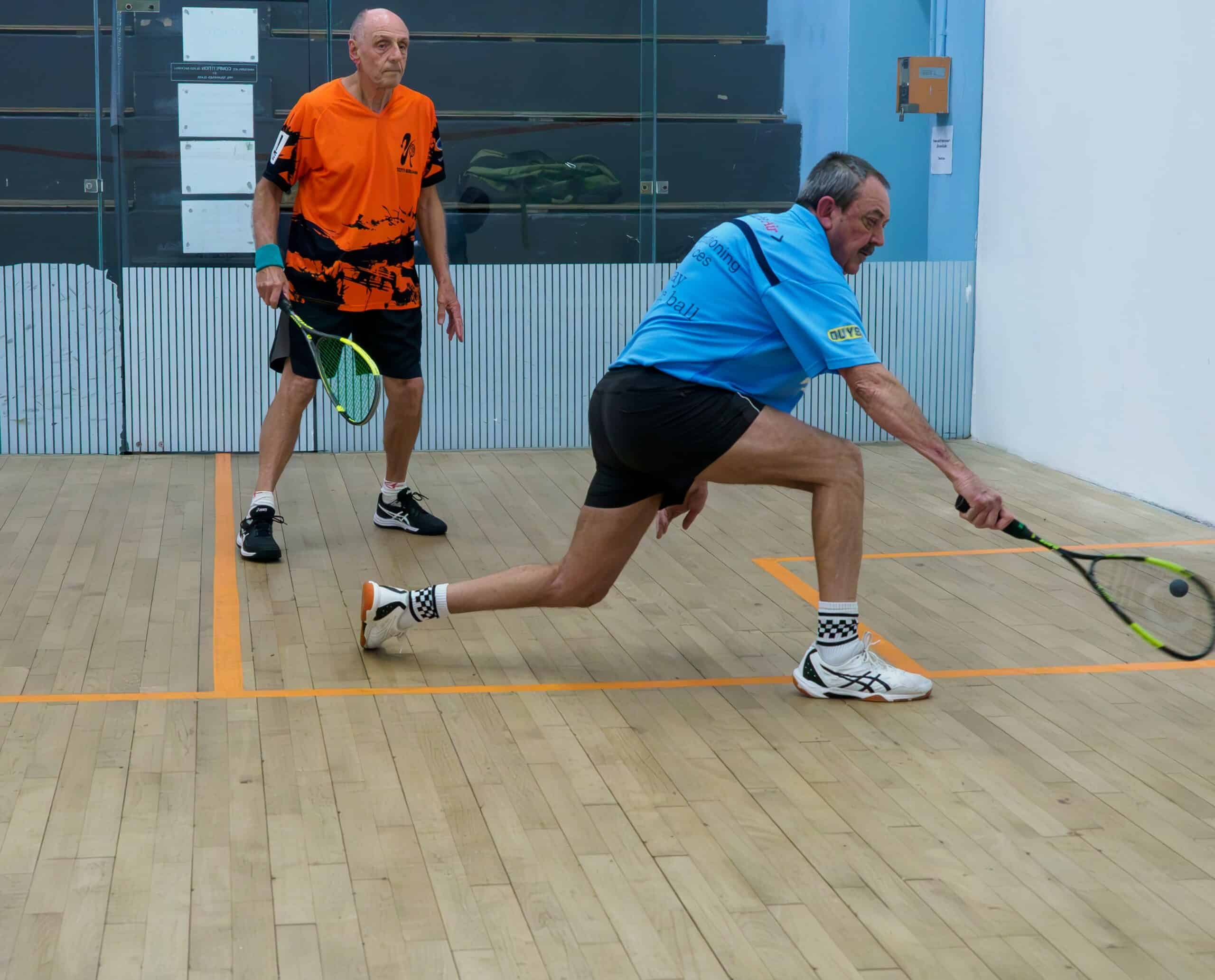 Two men playing squash