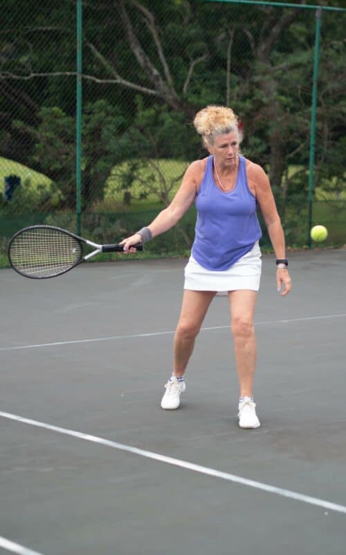 A woman playing tennis. 