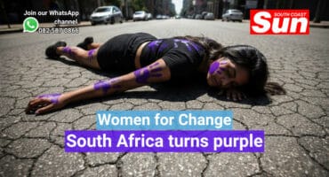 A woman lying down on the floor.