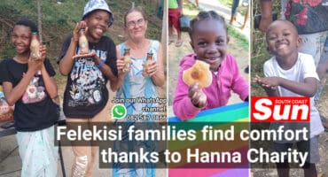 Women and children posing and smiling