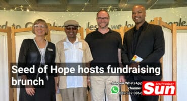 A group of people, one woman and three men.