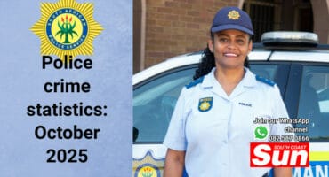 A police officer smiling.