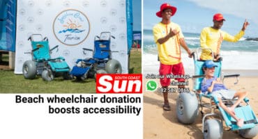 Two beach wheelchairs, three people, one disabled.