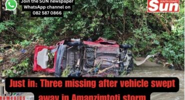 Overturned car in river