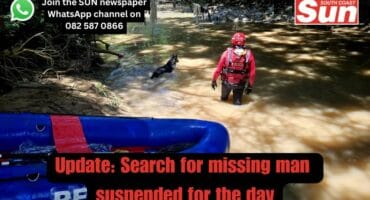 Dog with search teams in river