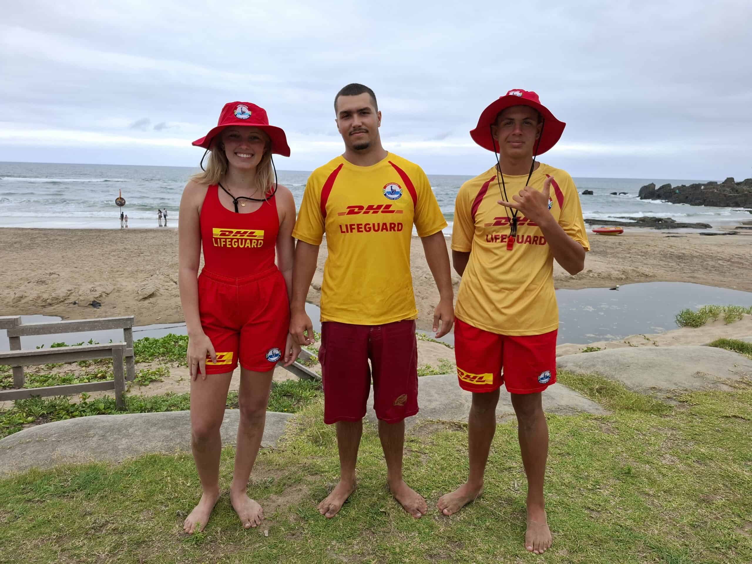 Three lifeguards on the beach