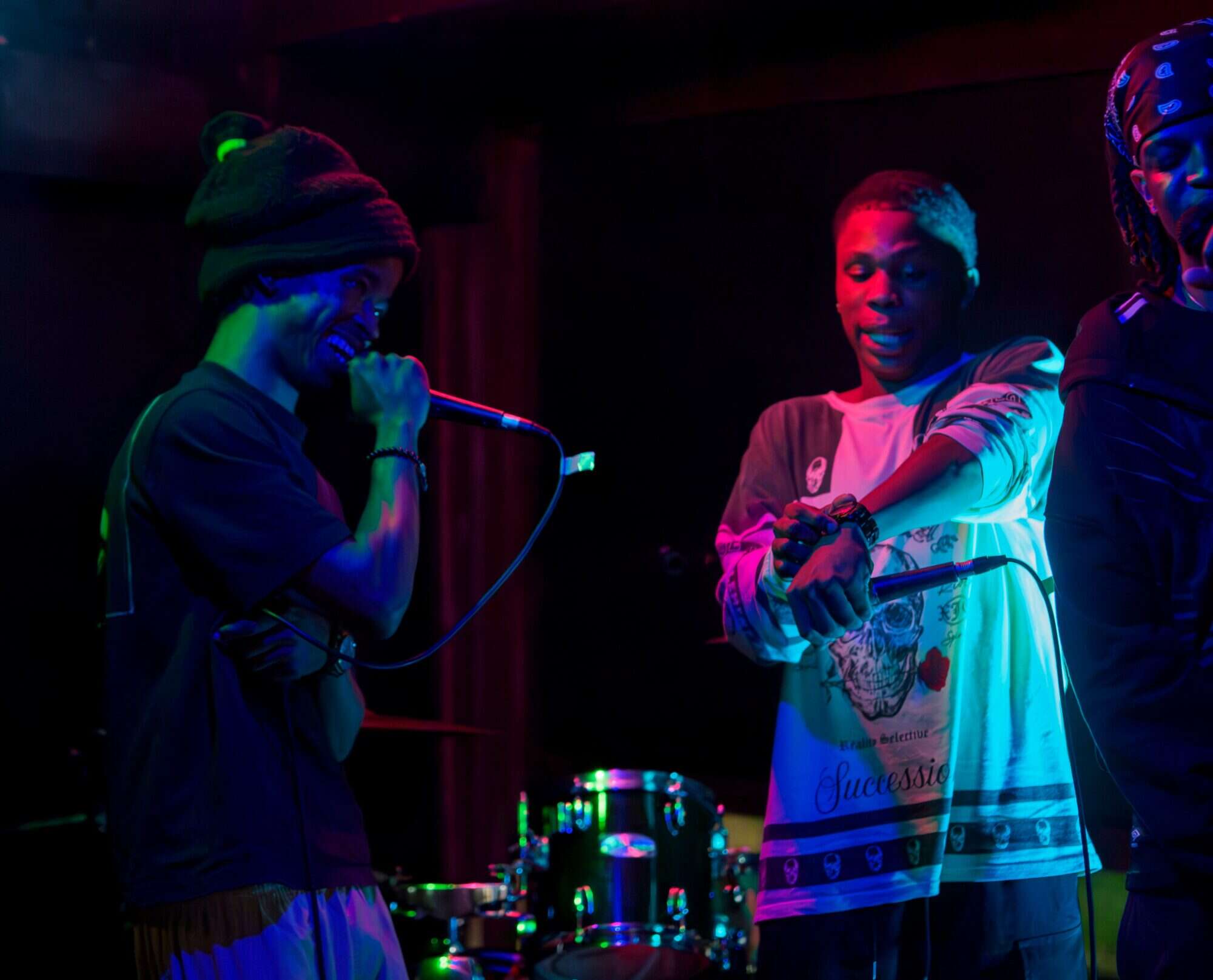 Hip-hop rappers performing on stage