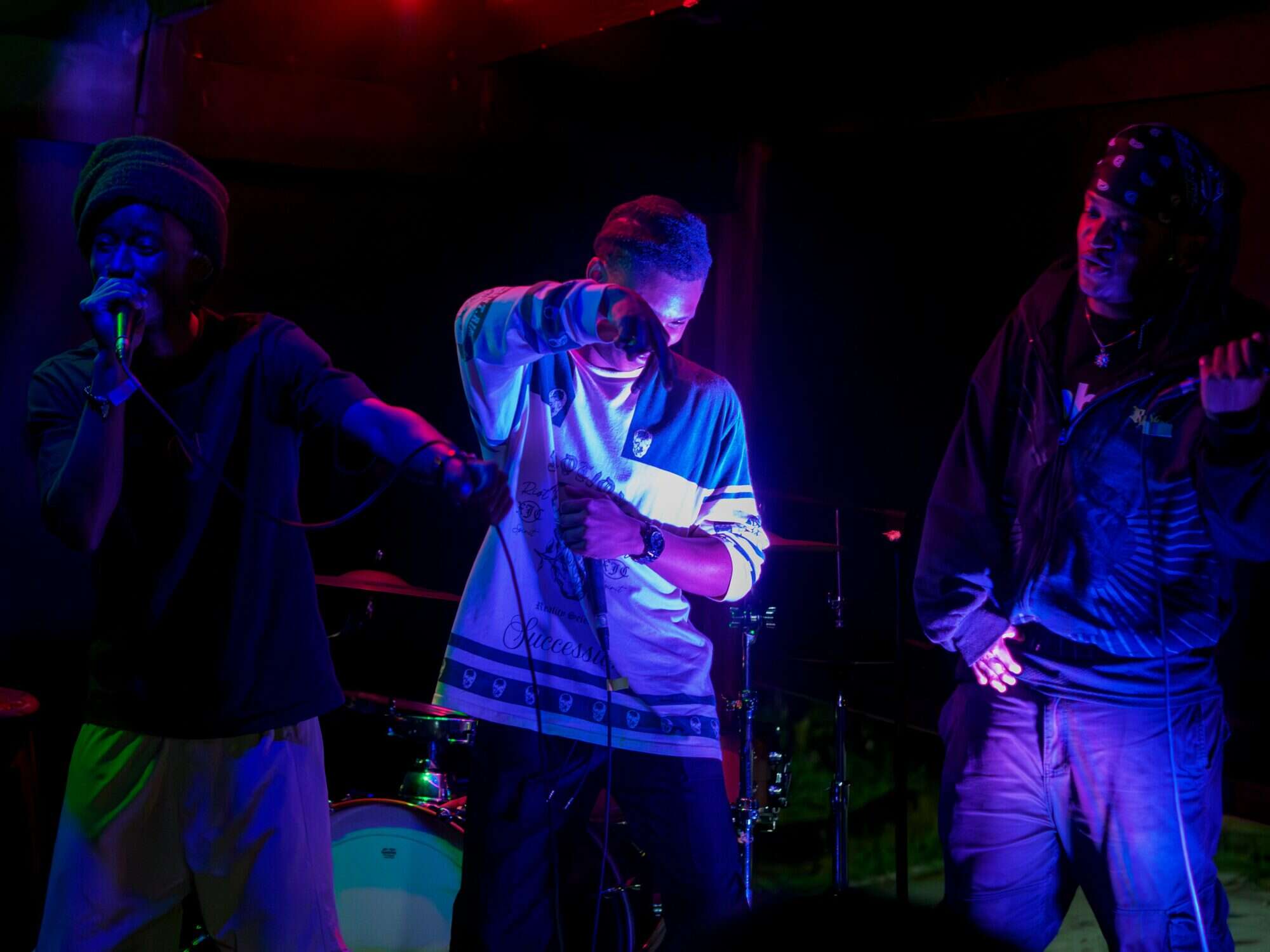 Hip-hop rappers performing on stage