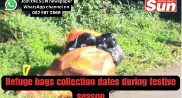 Orange and black bags on pavement