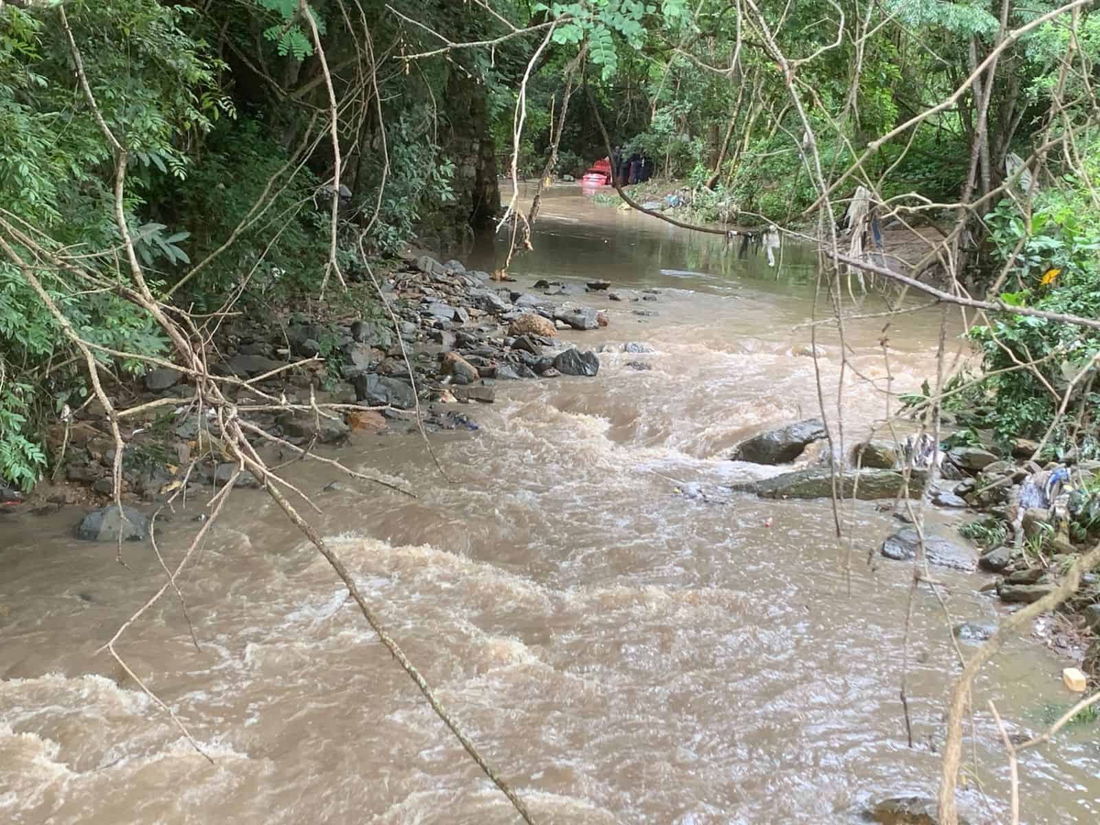 people searching a river