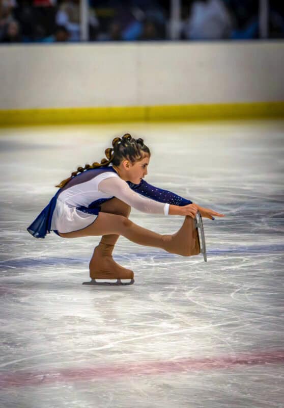 A figure skater performing on the ice.
