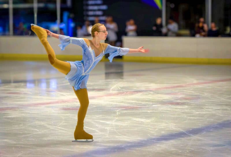 A figure skater performing on the ice.