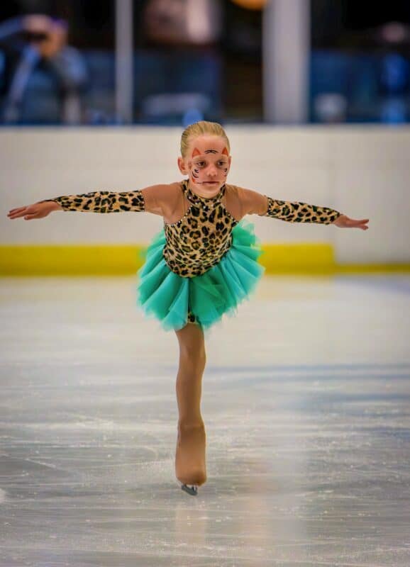 A figure skater performing on the ice.