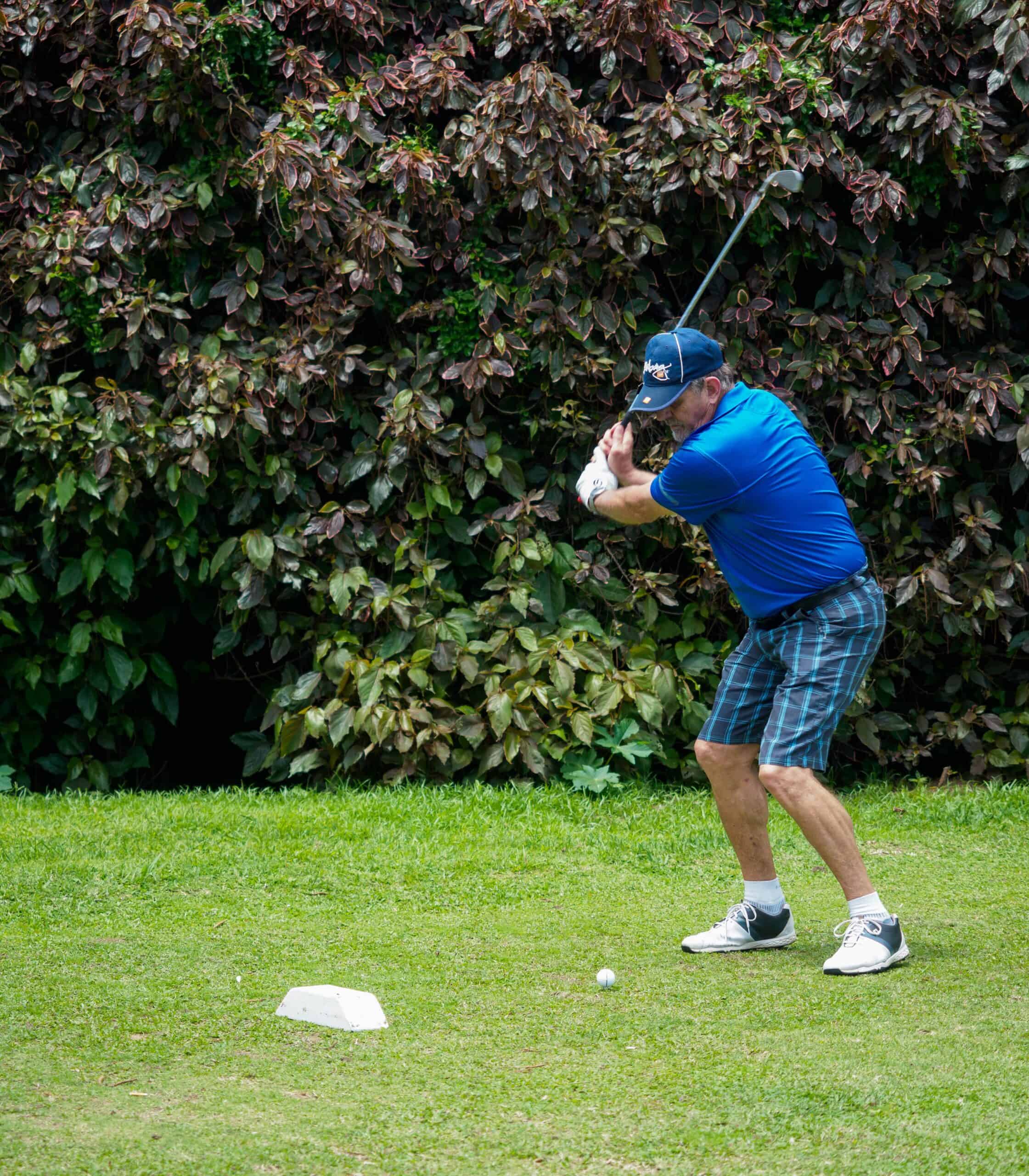 A golfer plays golf.