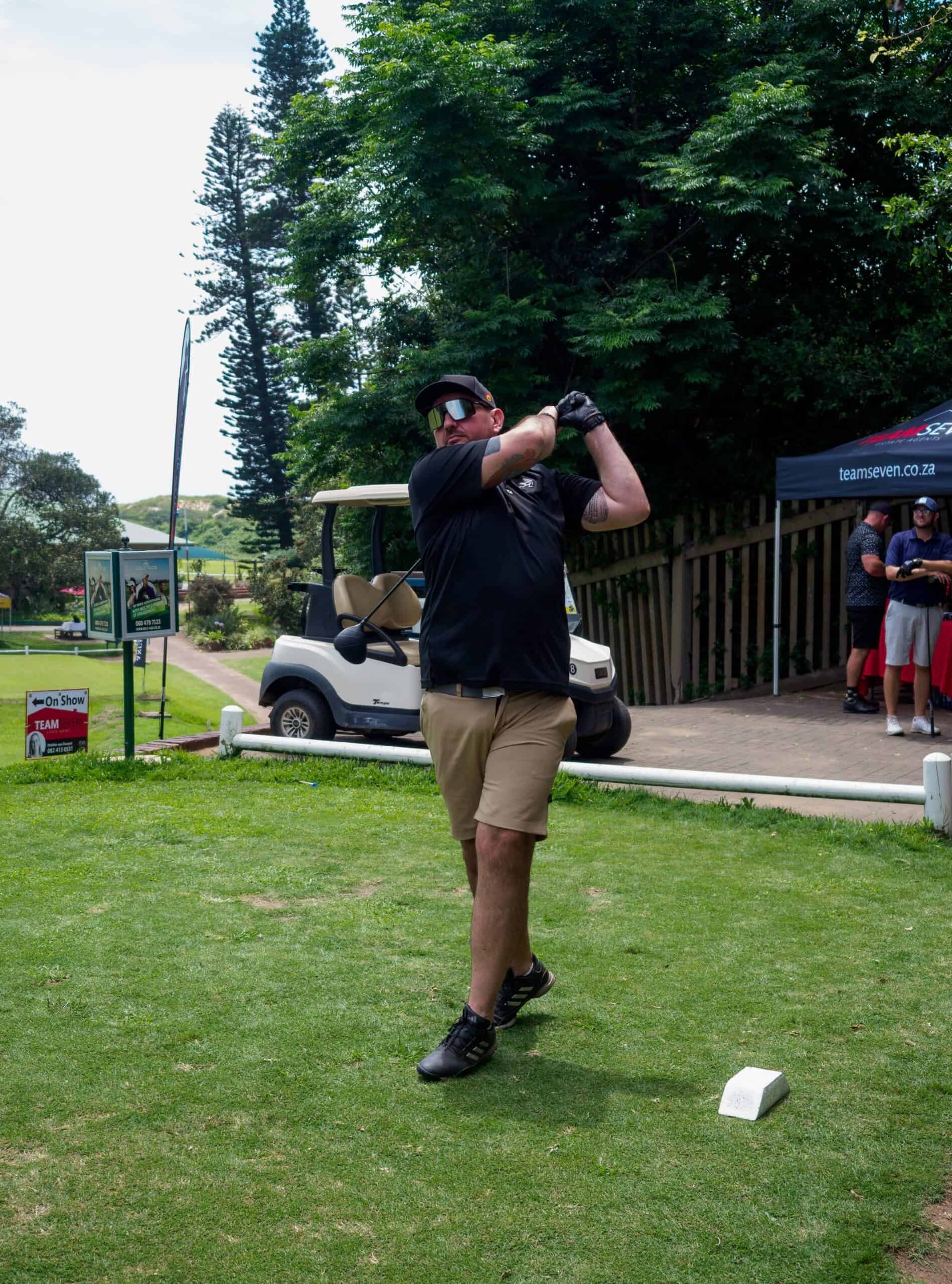 A golfer plays golf.