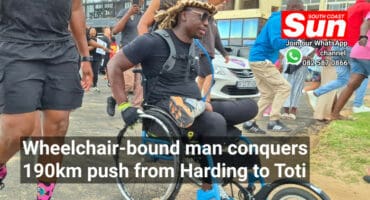 A disabled man in a wheelchair.