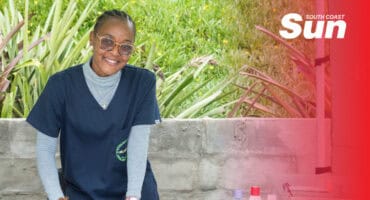 a paravet woman at a mobile vet stand