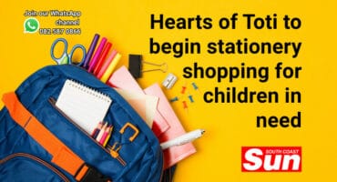 A bag with stationery coming out of it.