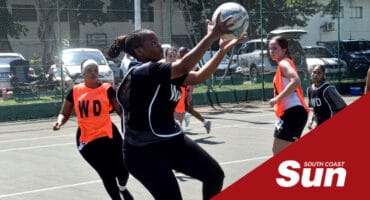 a netball player with the ball