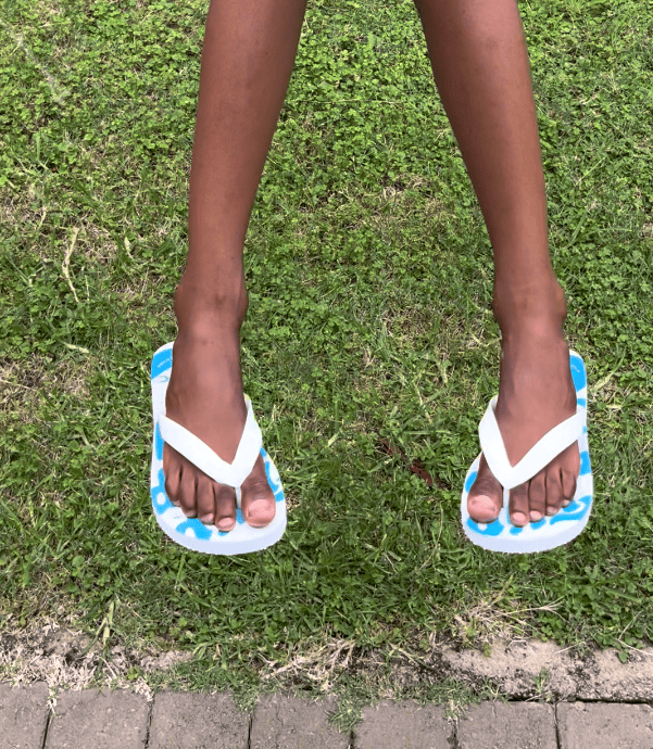 A child wearing flip flops