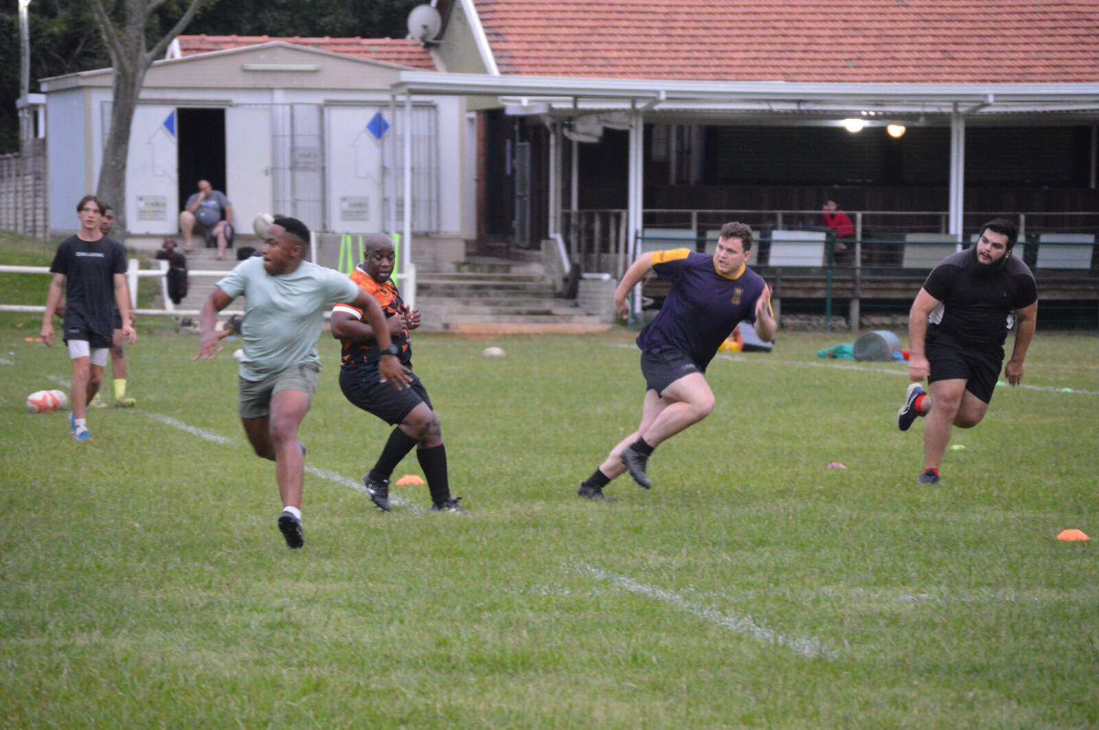 rugby players training on field