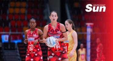 a netball player holding the ball
