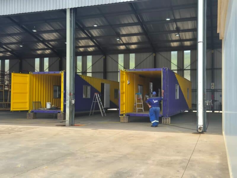 container classrooms under an open warehouse