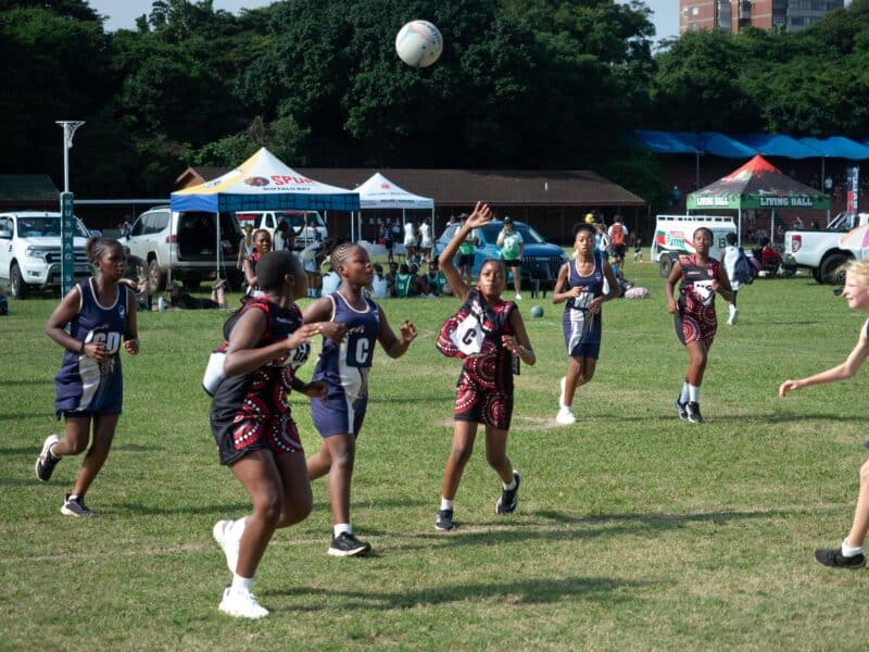 a netball player passing the ball