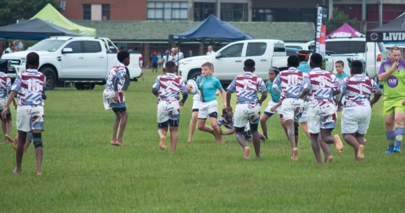 a rugby player running down the field