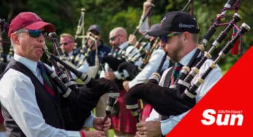 a bagpipe band playing during a performance.