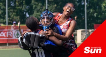 hockey players celebrating after a win
