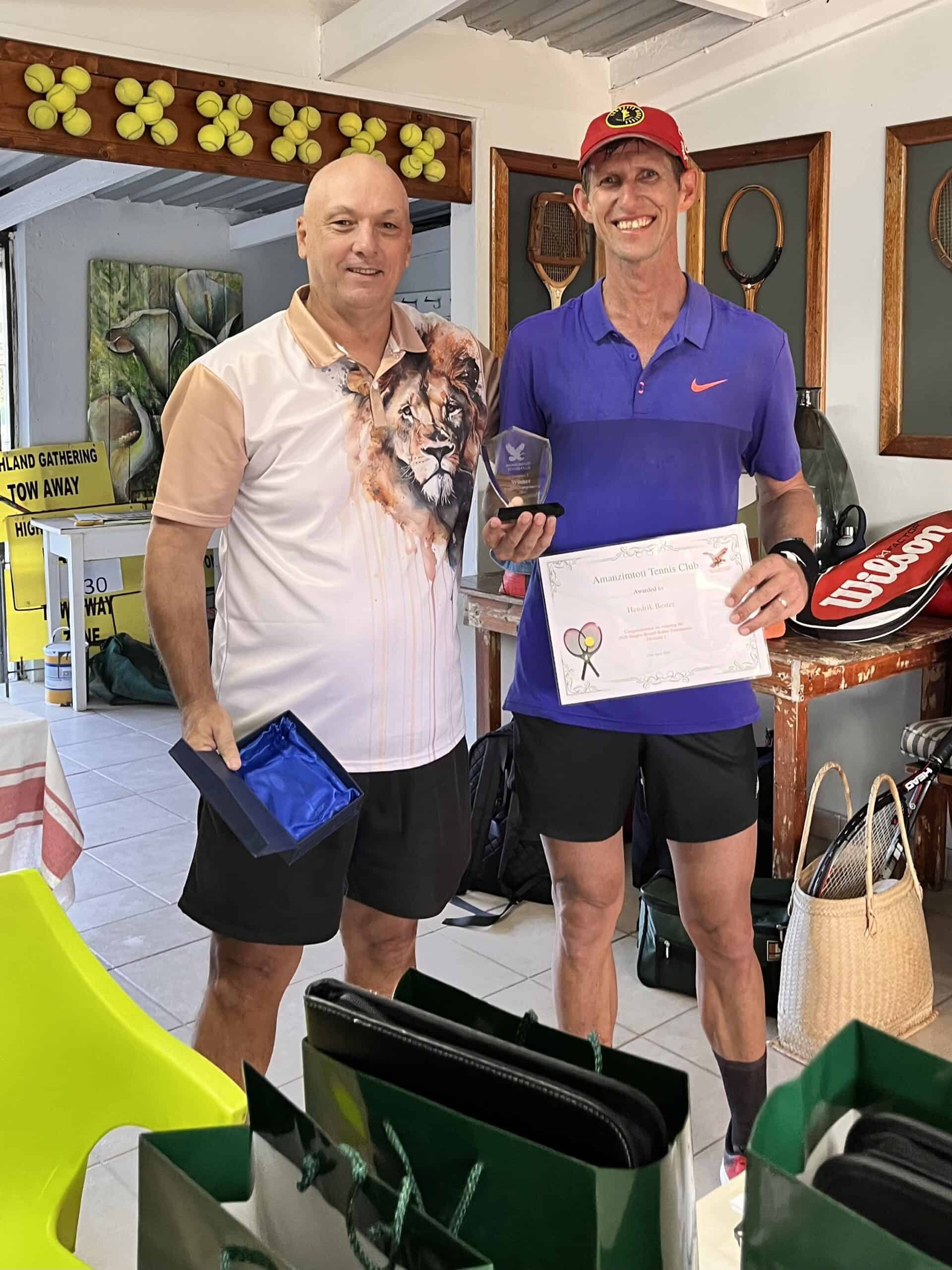 a man handing a tennis player a trophy and certificate