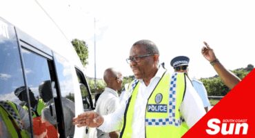 A man using a high visibility reflective vest