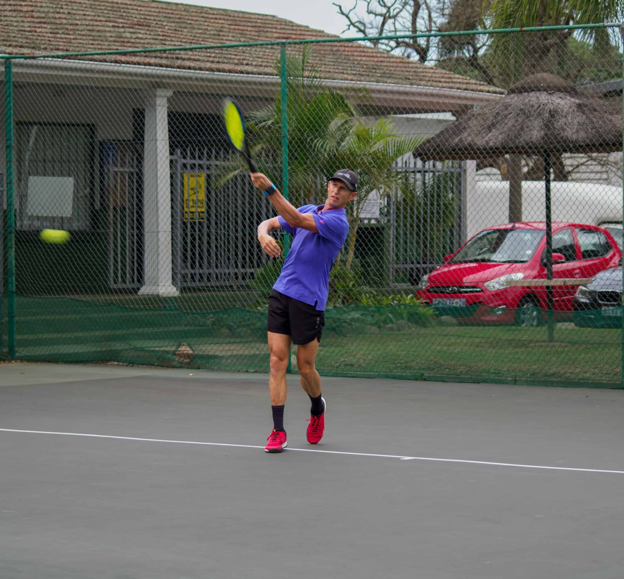 a man playing tennis