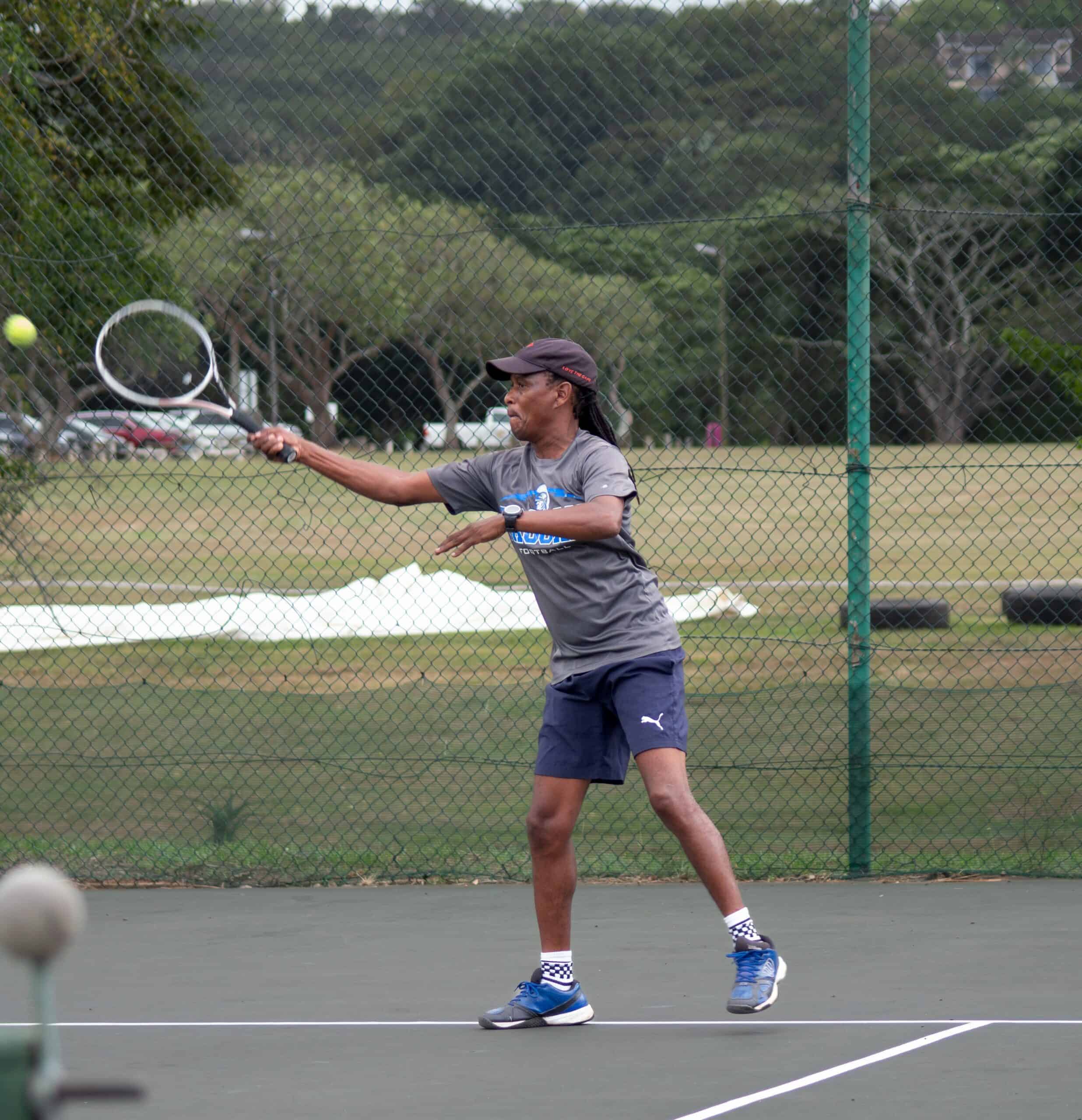 a man playing tennis