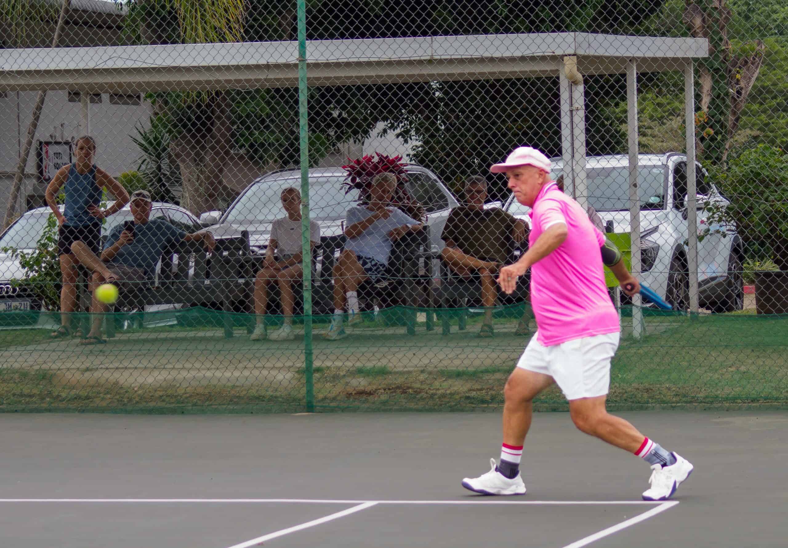 a man playing tennis