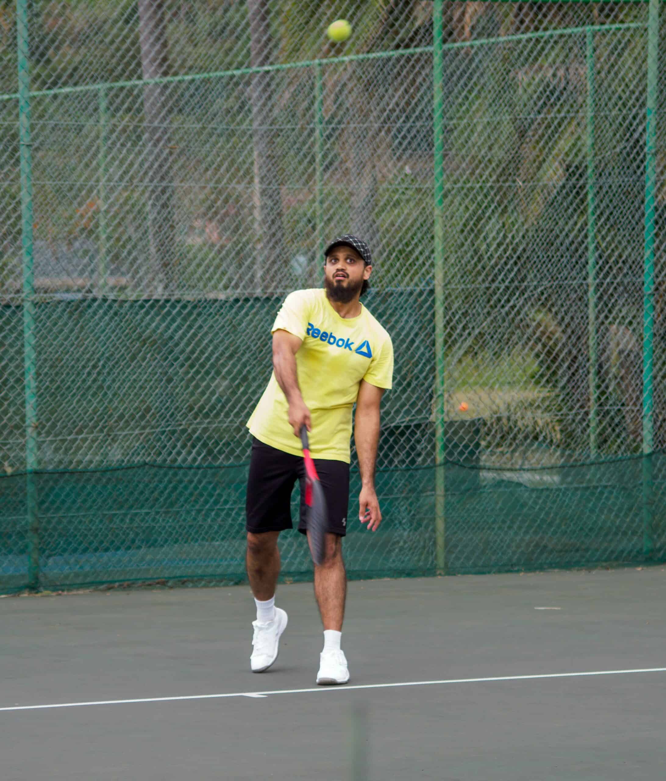 a man playing tennis