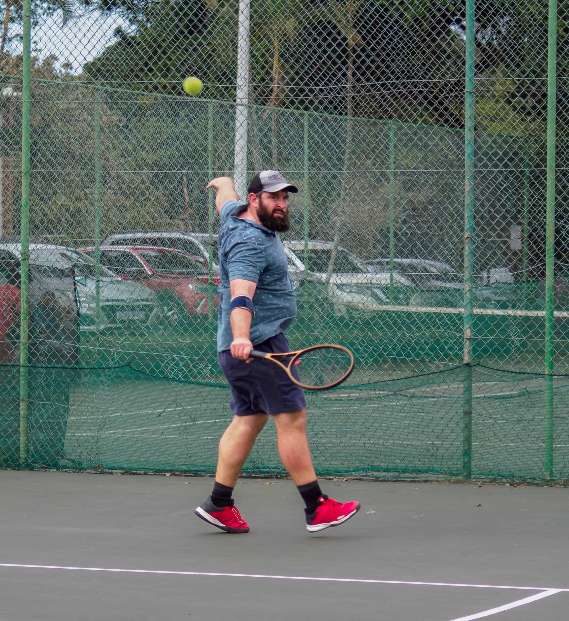a man playing tennis