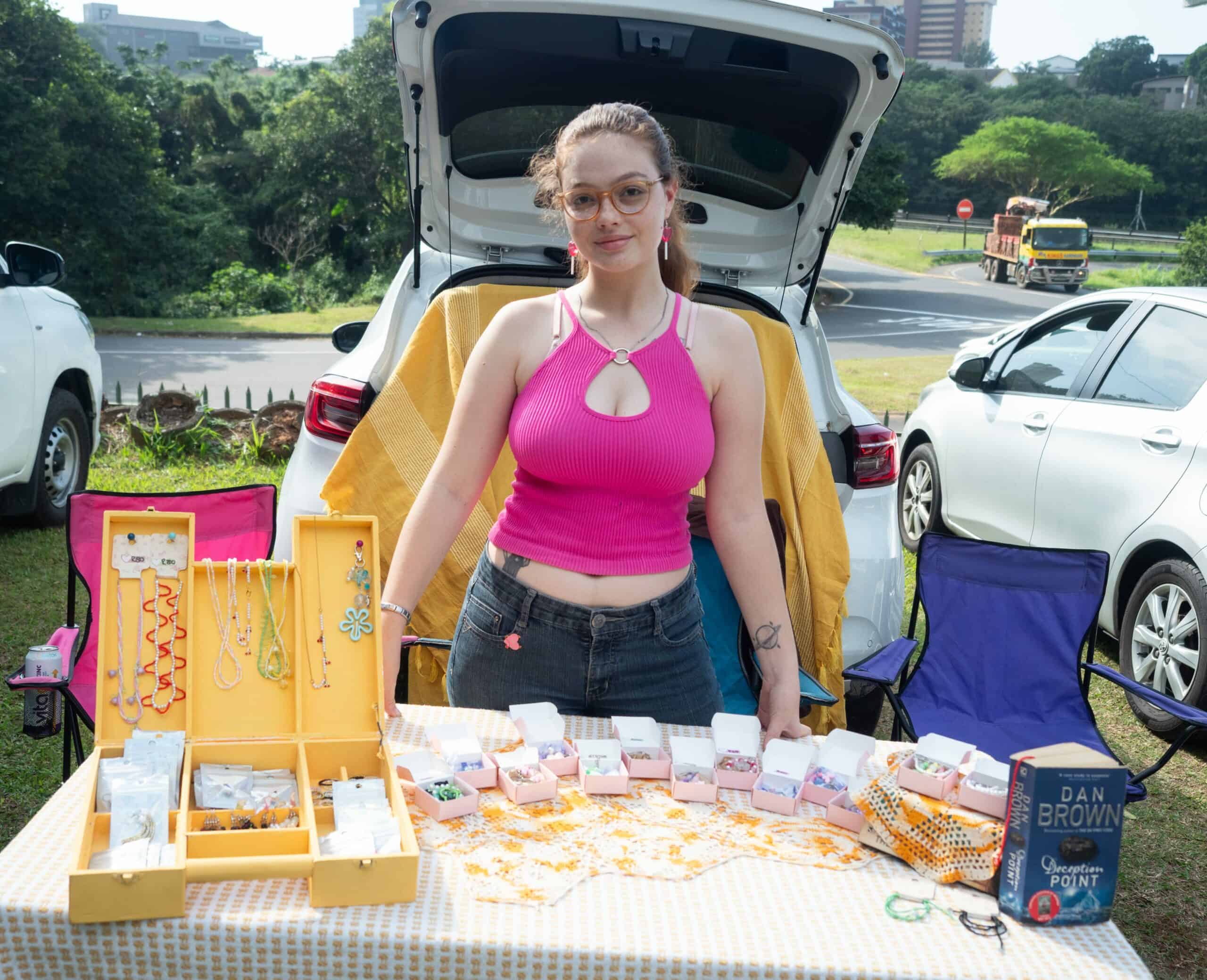 a young woman at a market stall carboot sale