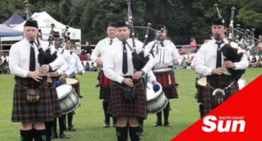 pipe bands playing at a highland gathering
