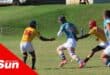 Four rugby players on the field