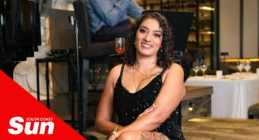 a portrait of a women at a glamorous event