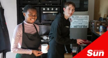 two young adults working at a skills training coffee shop