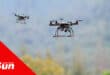 two drones flying in the sky